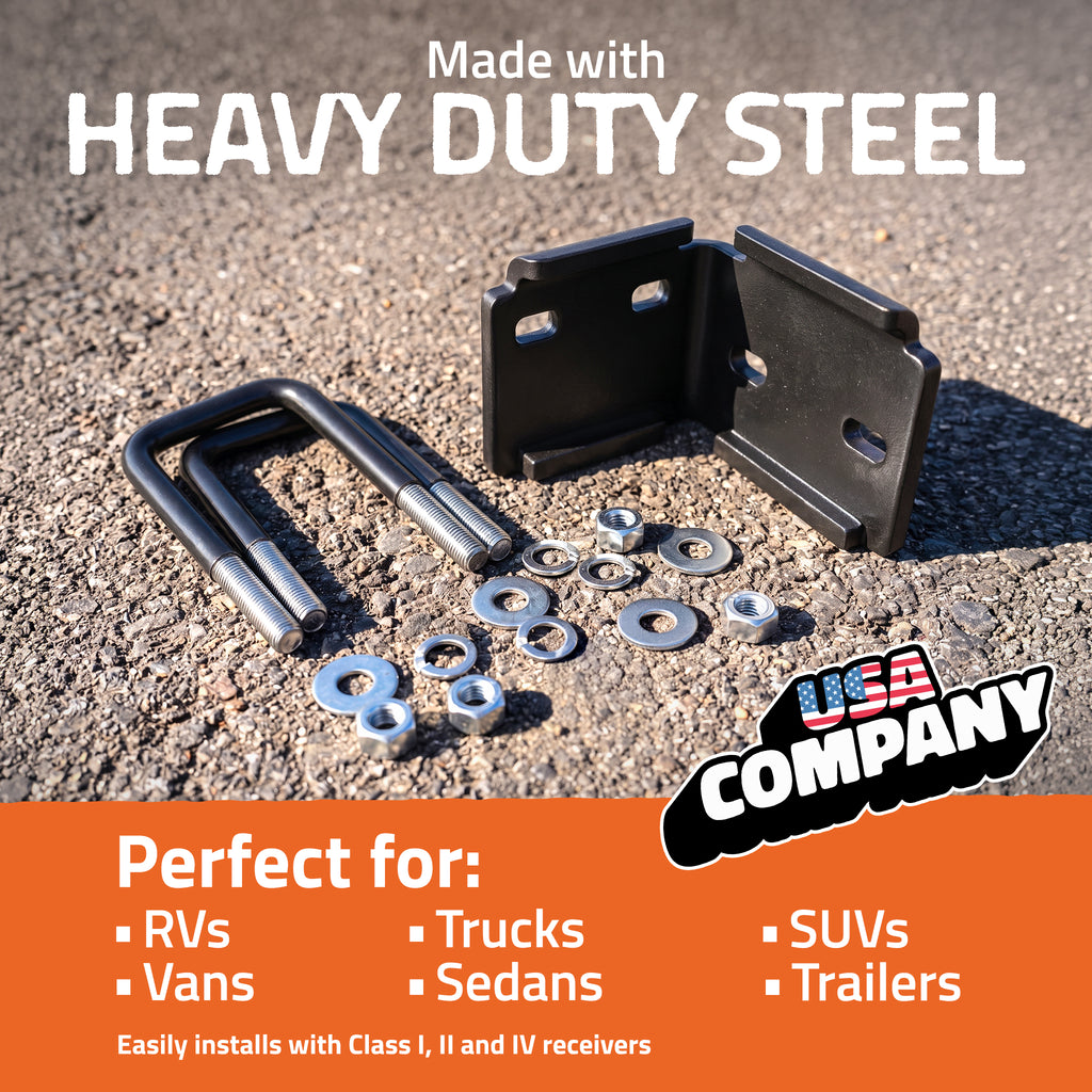 Black heavy-duty steel mounting brackets and hardware displayed on asphalt, with promotional text reading 'Made with HEAVY DUTY STEEL' and 'Perfect for: RVs, Vans, Trucks, Sedans, SUVs, Trailers.' A 'USA COMPANY' logo appears in the lower right.